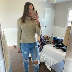 Tan turtleneck sweater